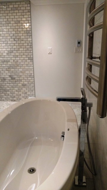 After - Basement Spa Bathroom