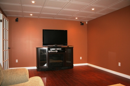 After - Laminate Flooring Basement Home Theater Room